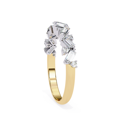 Angled side view of a yellow gold ring with baguette cut diamonds and round accents