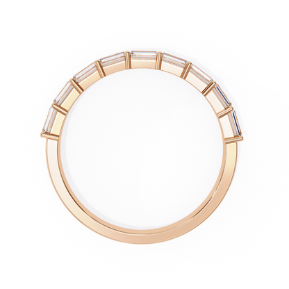 Top view of rose gold ring displaying baguette cut diamonds in a curved setting