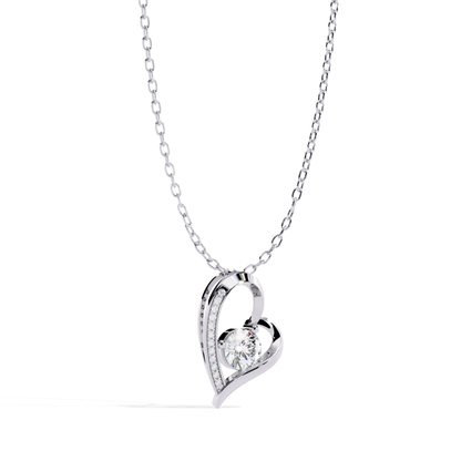 angled front view diamond heart pendant in white gold with round diamond