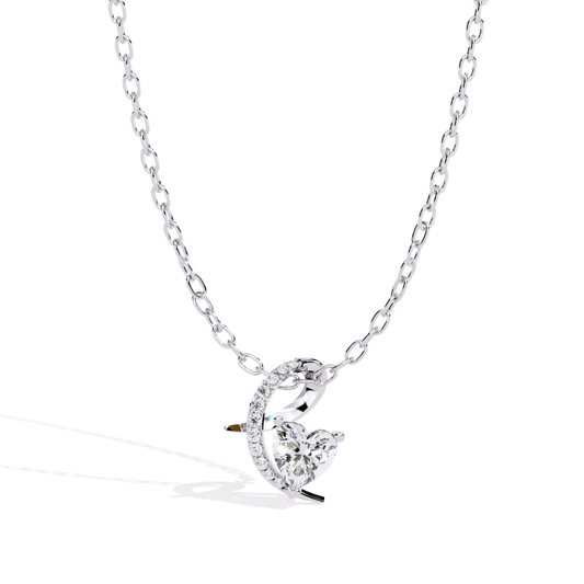 White gold heart cut diamond pendant with elegant curved frame