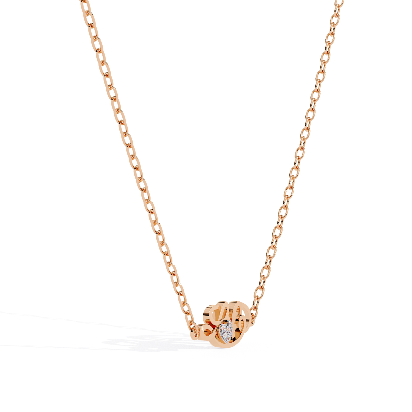 Angled view of a rose gold pendant displaying a flowing love motif with a heart-shaped diamond centerpiece.