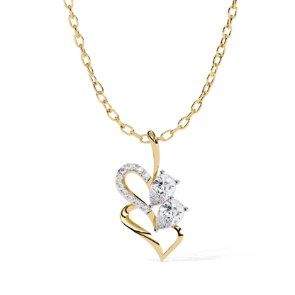 Heart-shaped pendant with an open flowing design, featuring two pear-cut stones and a curved row of small round set stones within the heart form