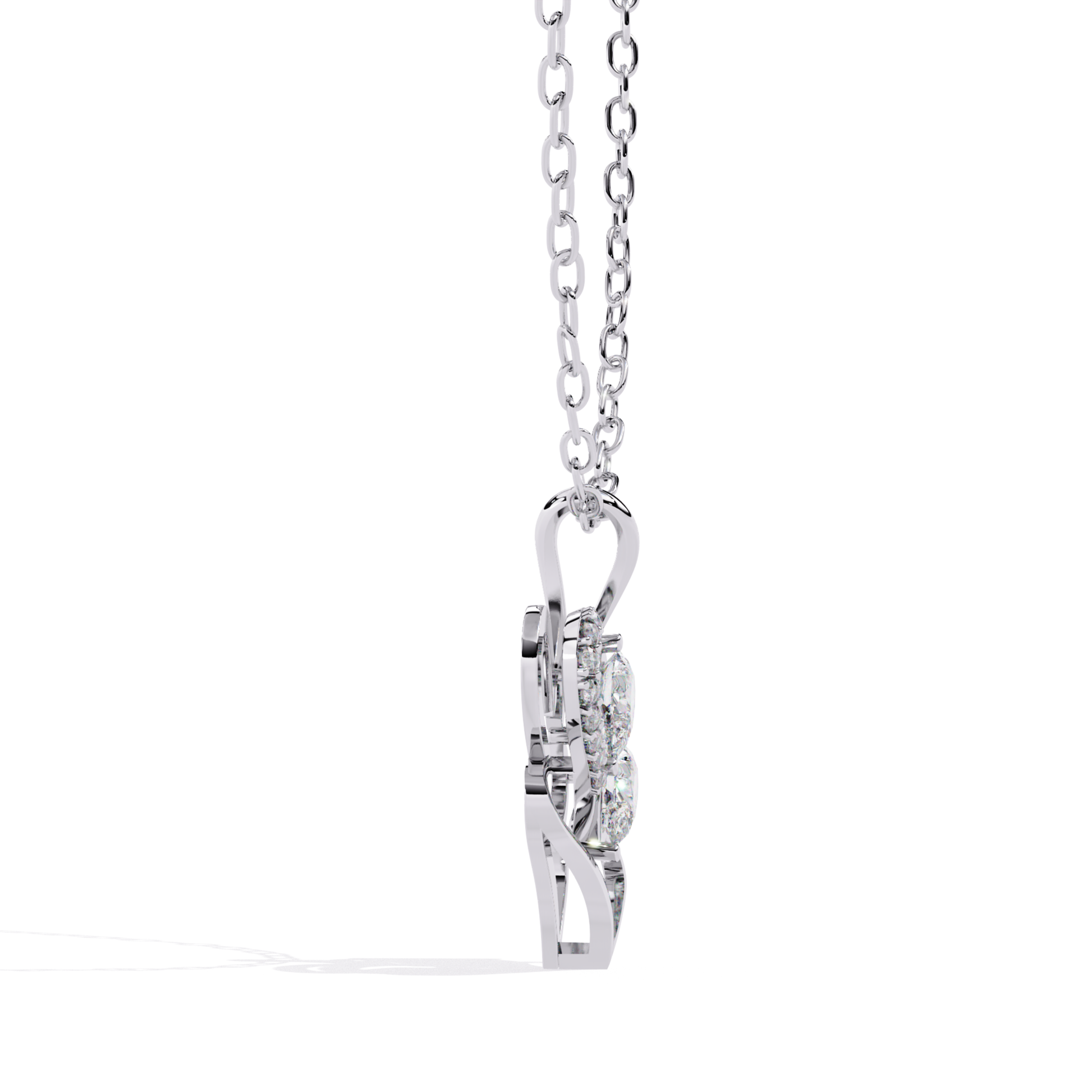 Side view of an open heart pendant displaying a layered design with two round-cut diamonds and a row of small round accent diamonds positioned inside the heart form