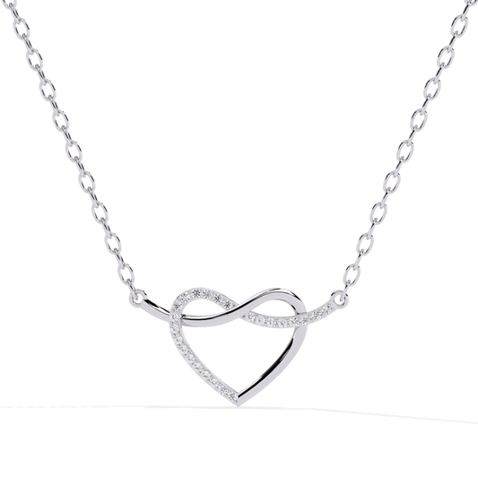 Heart shape diamond pendant with chain in white gold showcasing an elegant open heart pattern with round diamonds placed along the flowing curve and a clean bright metal surface
