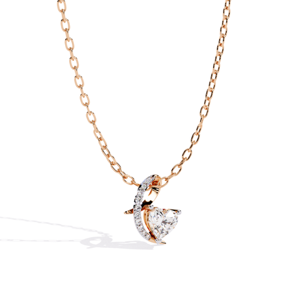 Rose gold heart pendant with center diamond and sparkling side accent