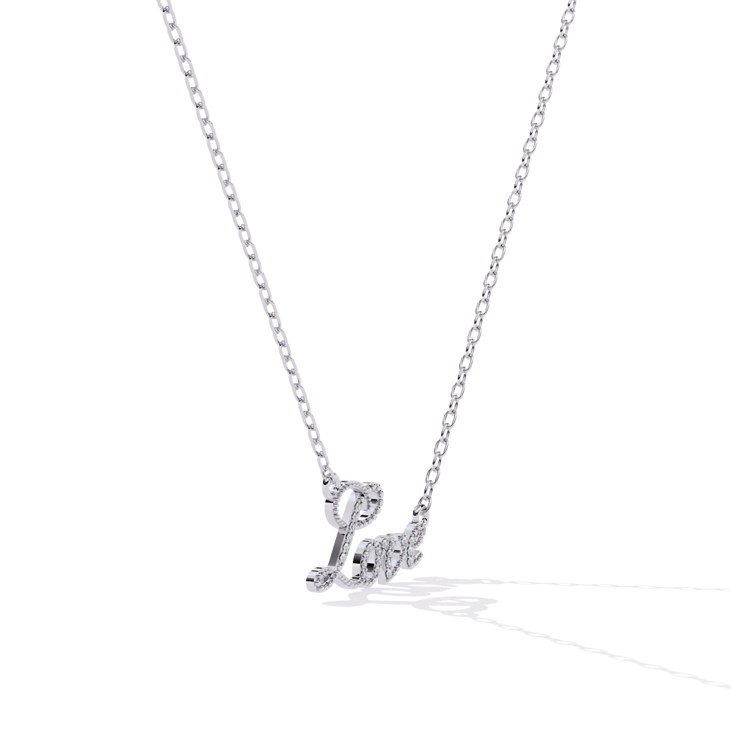Angled view of white gold love pendant highlighting the thickness and curved design