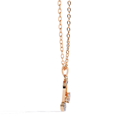 Rose gold music note necklace with heart base and refined stone detailing