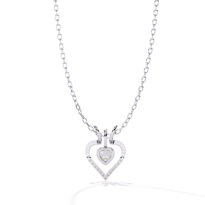open heart diamond pendant in white gold showcasing heart cut center stone with round accent diamonds placed in a neat line setting