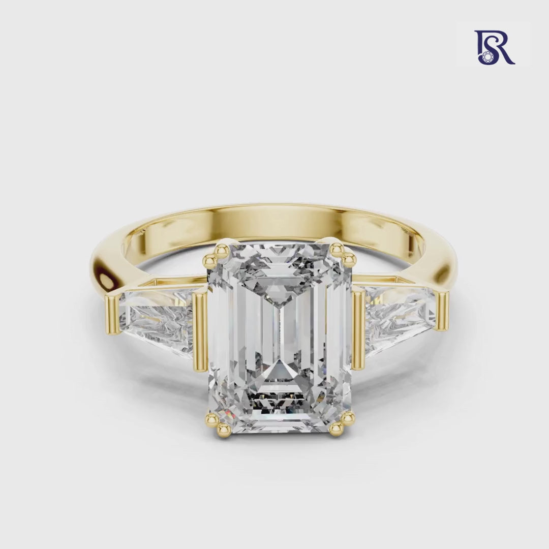 Emerald cut diamond ring front view
Emerald cut center diamond ring close detail
Emerald cut diamond ring with side stones
Emerald cut diamond ring clean setting
Diamond ring with elongated center stone
Emerald cut diamond ring studio image
Diamond ring with structured side accents
Emerald cut diamond ring refined finish
Diamond ring with bold center focus
Emerald cut diamond ring modern style