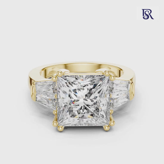 Step cut diamond ring front view
Geometric center diamond ring close detail
Step cut diamond ring side stone design
Diamond ring with bold center stone look
Step cut diamond ring refined setting
Diamond ring with angular center style
Step cut diamond ring studio image
Diamond ring with structured stone layout
Step cut diamond ring clean jewellery finish
Diamond ring with prominent center focus