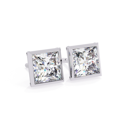 Modern princess cut diamond stud earrings with a bezel setting in white gold