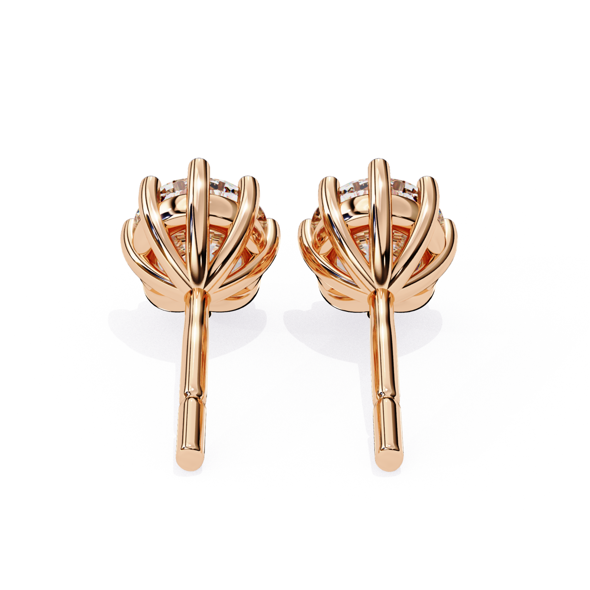 Rose gold earrings with a floral design on a white background