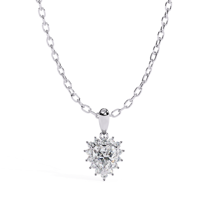 Front view of a white gold pendant with clustered round diamonds