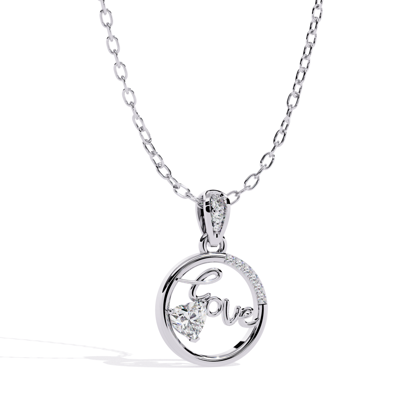 Side view of a white gold round pendant showcasing a love motif with a heart-shaped diamond set inside the frame.