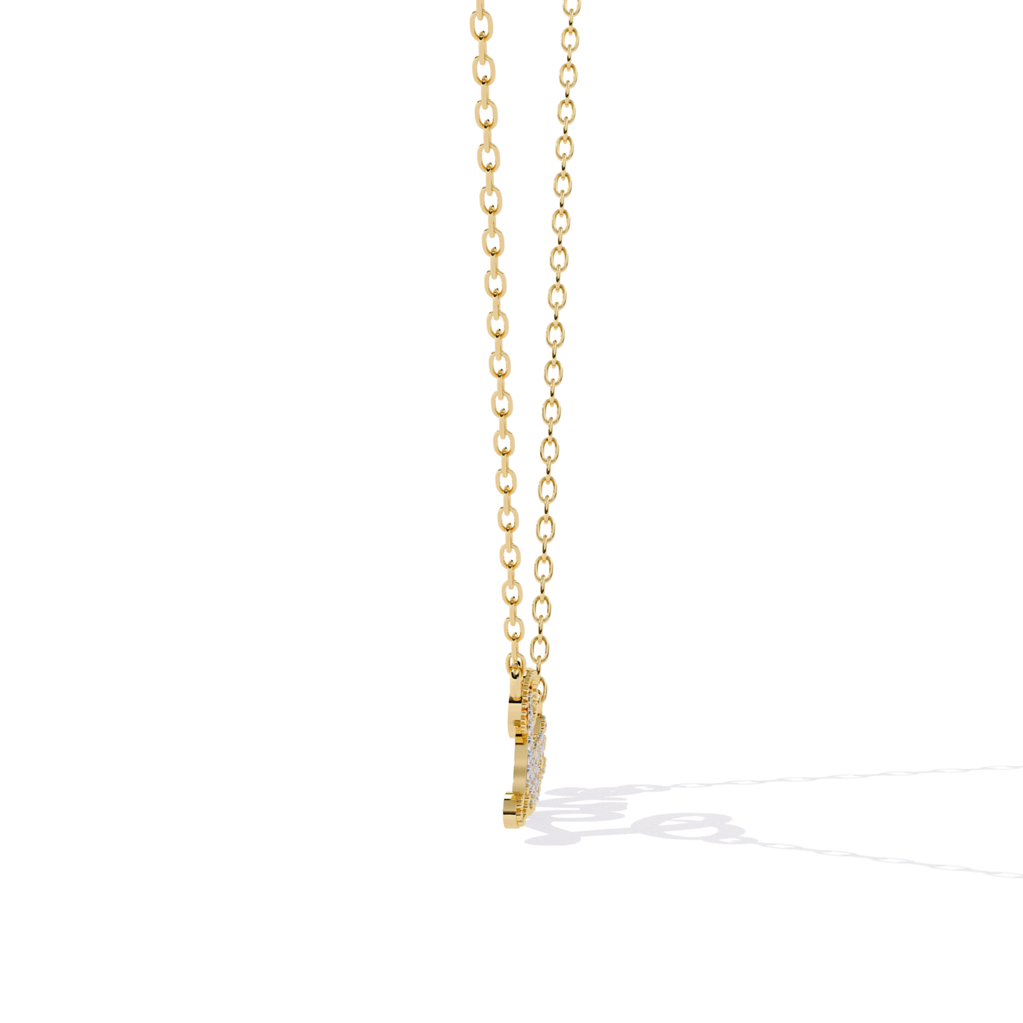 Gold necklace with a small pendant on a white background
