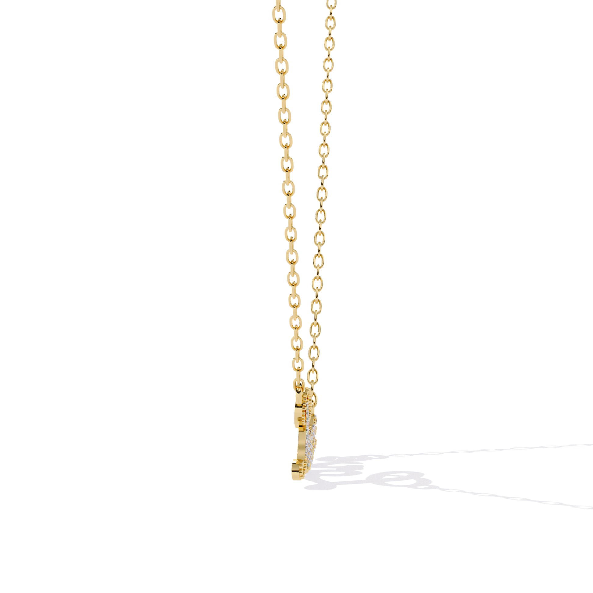 Gold necklace with a small pendant on a white background