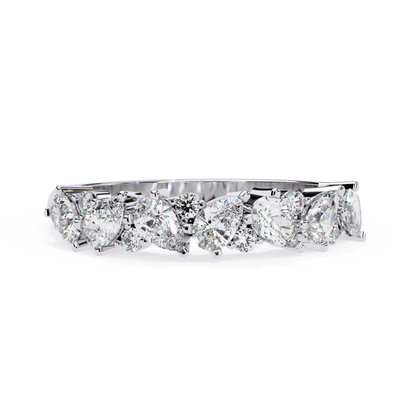 Diamond ring with pear-shaped and round diamond
