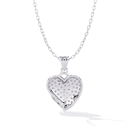 White gold double heart round pavé diamond pendant back view highlighting evenly spaced round diamond seat holes, smooth polished rear surface, and layered heart design