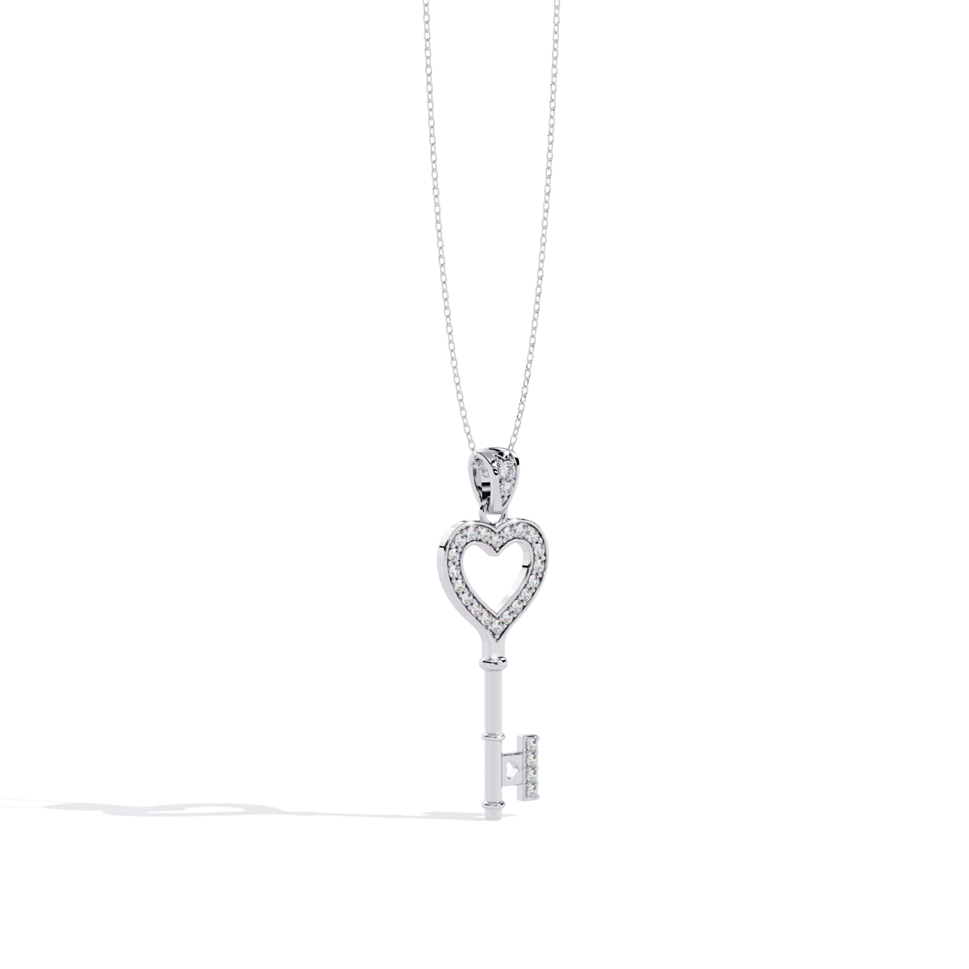 White gold open heart key pendant featuring a diamond-lined heart bow, smooth vertical key shaft, and a rectangular diamond-set key end