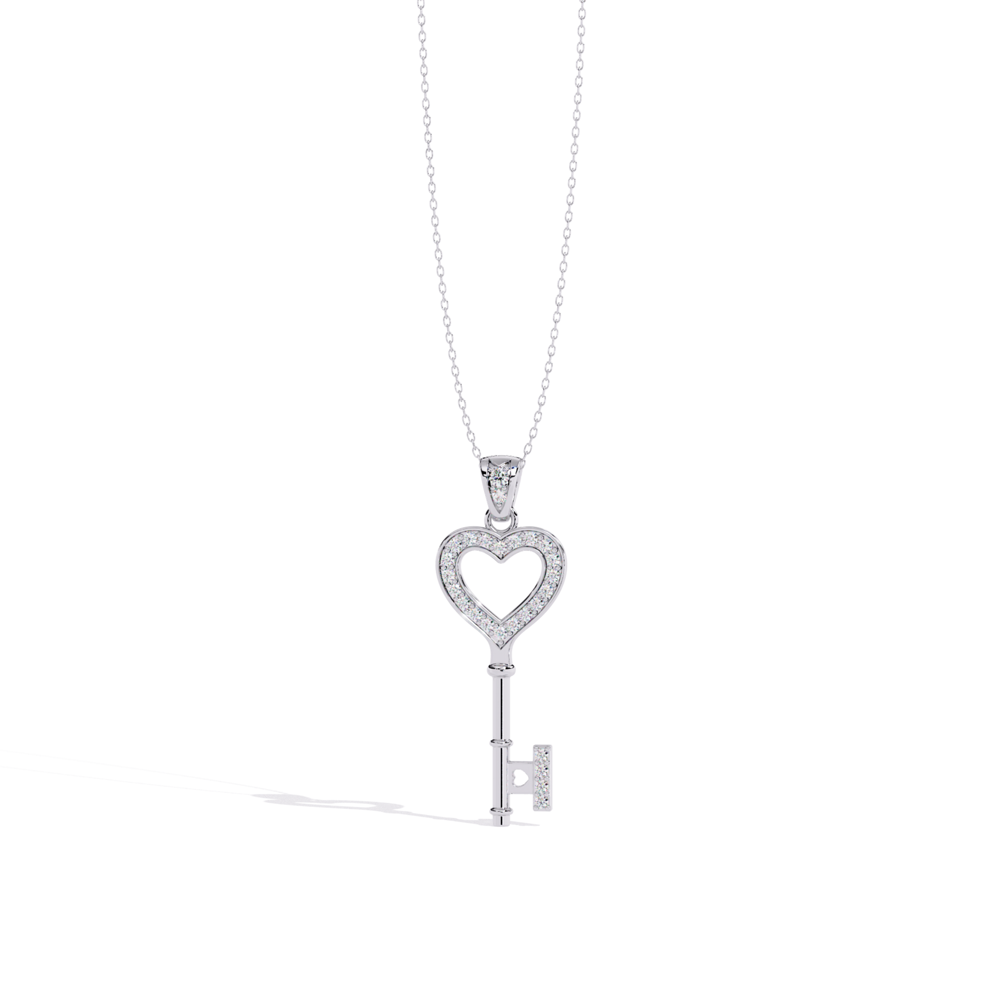 White gold open heart key pendant with an open heart bow outlined in diamonds and a sleek key stem finished with diamond-set key end