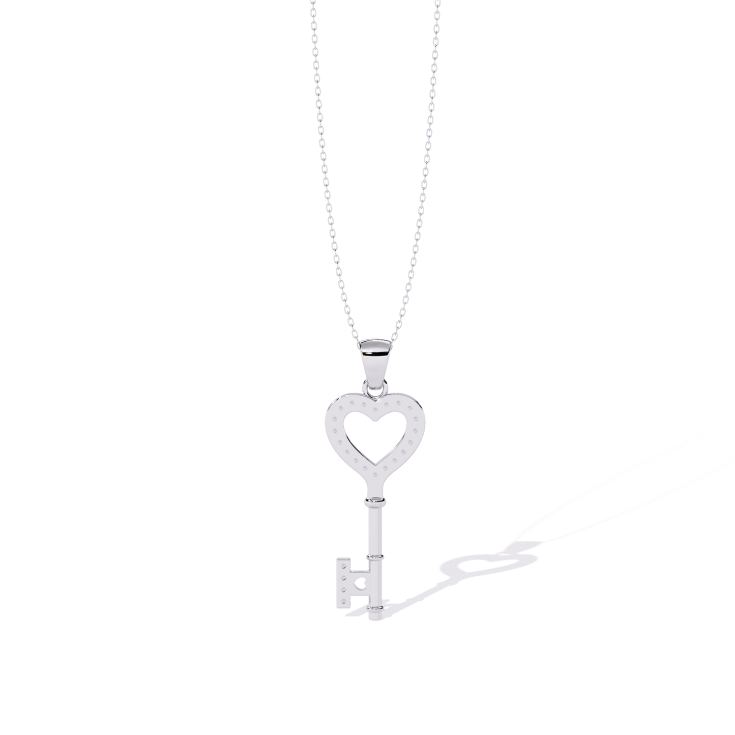 White gold open heart key pendant back view highlighting open heart cutout, scattered diamond setting holes, polished rear finish, and clean key back profile