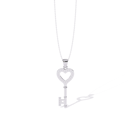 White gold open heart key pendant back view highlighting open heart cutout, scattered diamond setting holes, polished rear finish, and clean key back profile