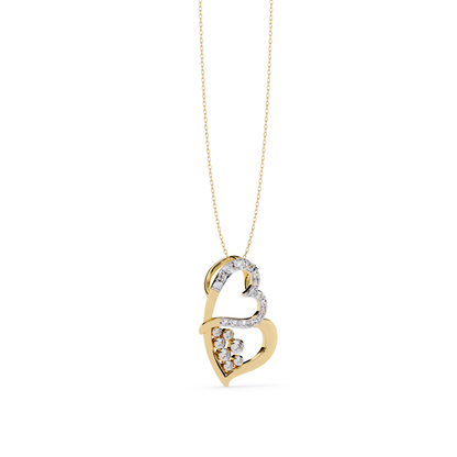 Yellow gold double heart pendant with round cut diamonds set in smooth curved frame featuring pave diamond accents and fine gold chain attached