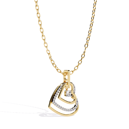 Yellow gold double open heart diamond pendant shown in an angled view featuring an outer open heart set with round pavé diamonds and an inner open heart accented with a dangling round diamond