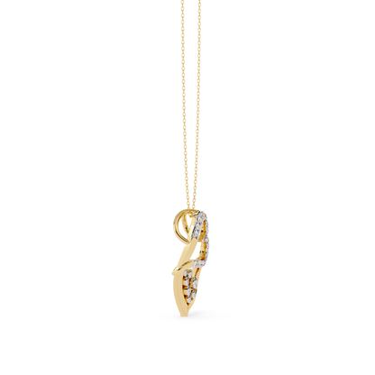 Side view of yellow gold heart shaped diamond pendant with chain featuring round cut diamonds set in pave style along the heart curve with smooth polished gold edges