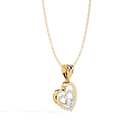 side angle view of a yellow gold heart pendant featuring a circular diamond arrangement with a raised center stone and polished finish