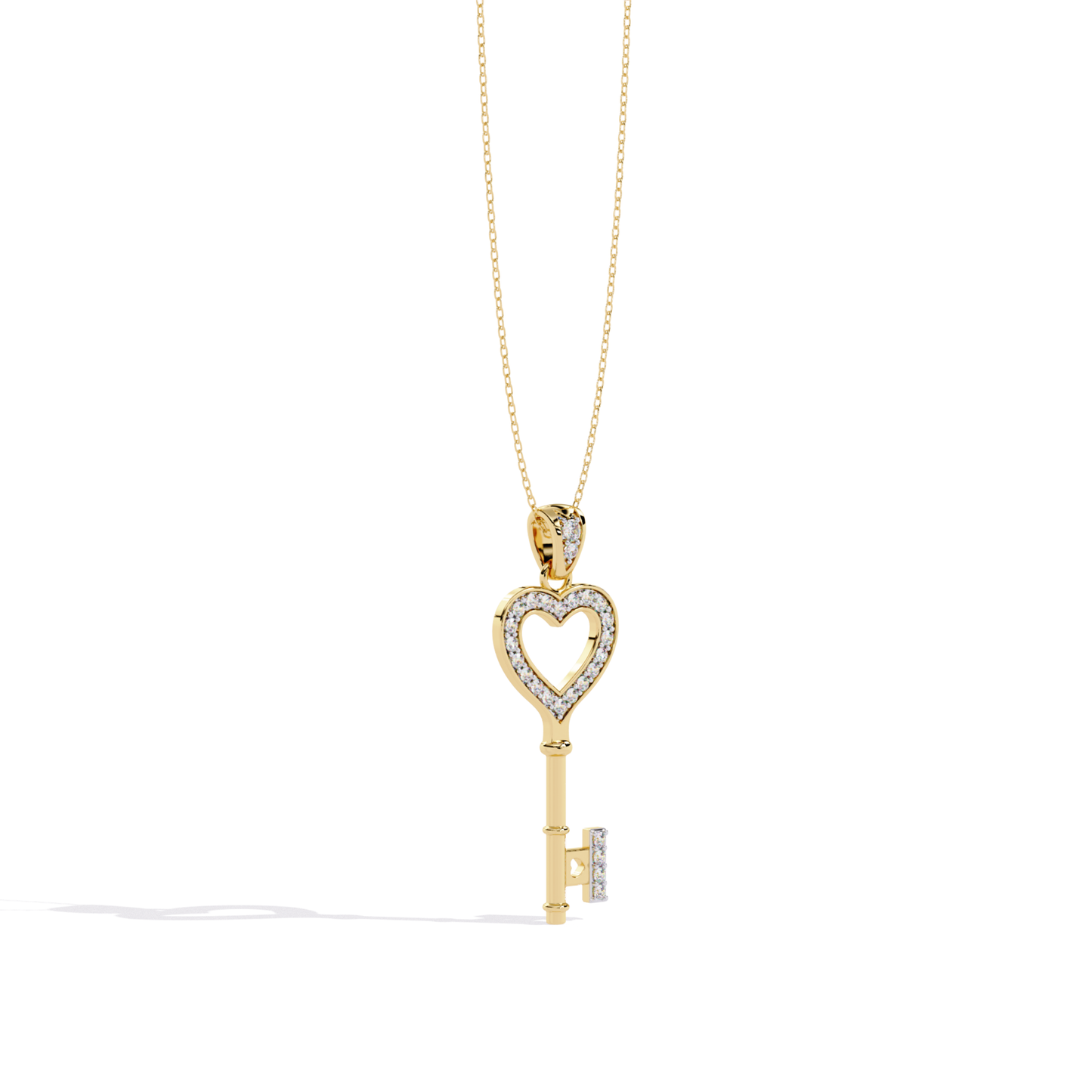 Yellow gold open heart key diamond pendant with heart-shaped open center outlined in diamonds, straight polished key stem, and diamond-accented key bit