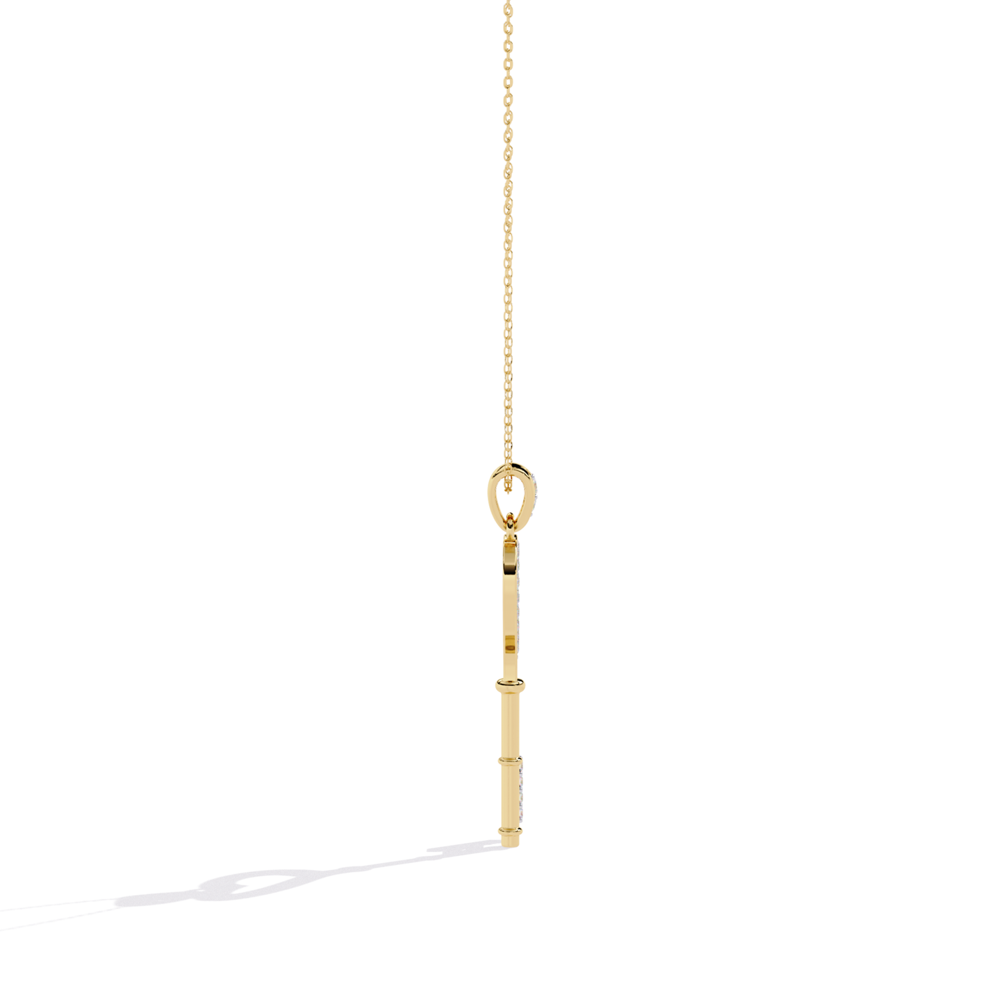 Yellow gold open heart key diamond pendant side profile showing flat straight key shaft, visible thickness, and diamond-set key bit from side view