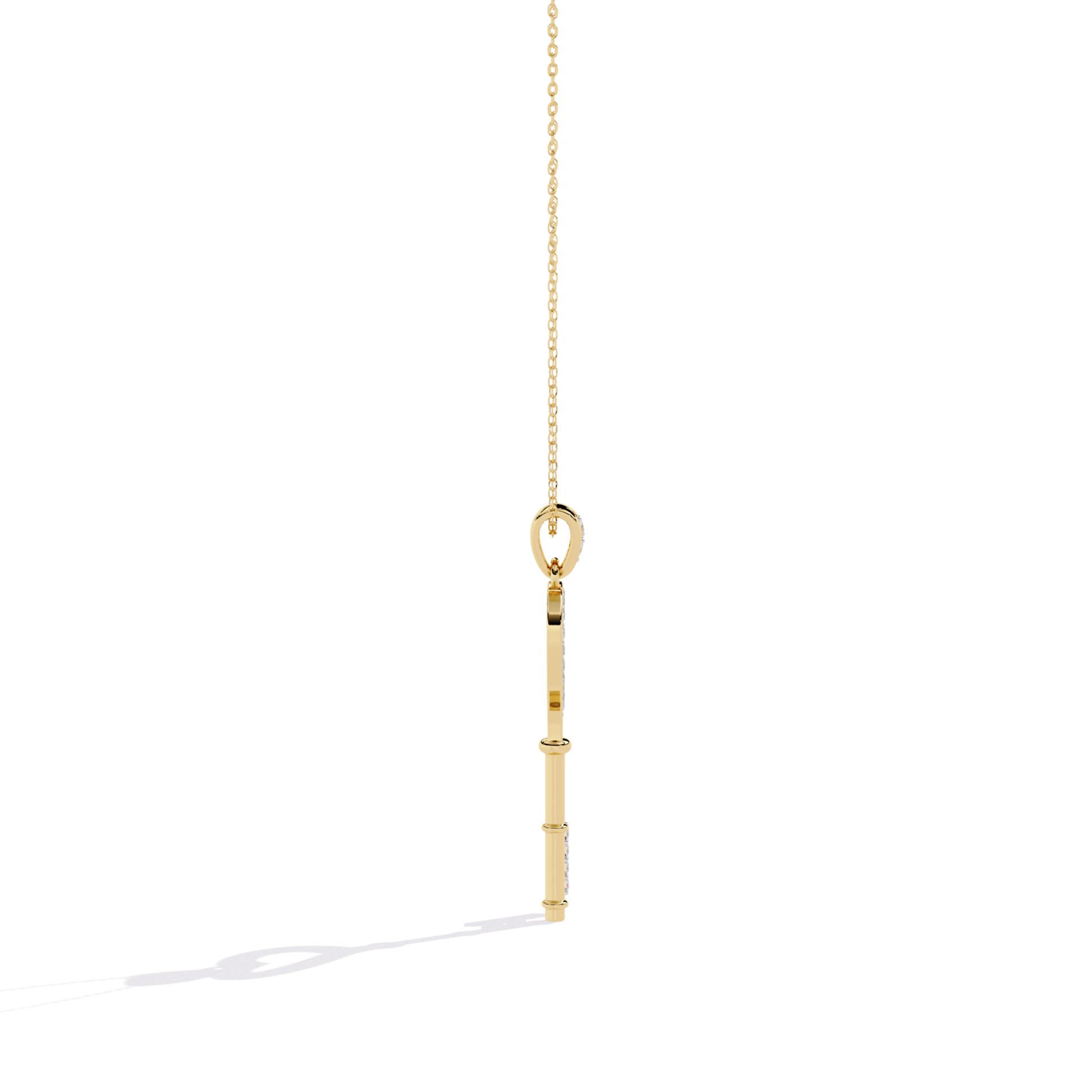 Yellow gold open heart key diamond pendant side profile showing flat straight key shaft, visible thickness, and diamond-set key bit from side view