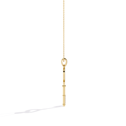 Yellow gold open heart key diamond pendant side profile showing flat straight key shaft, visible thickness, and diamond-set key bit from side view