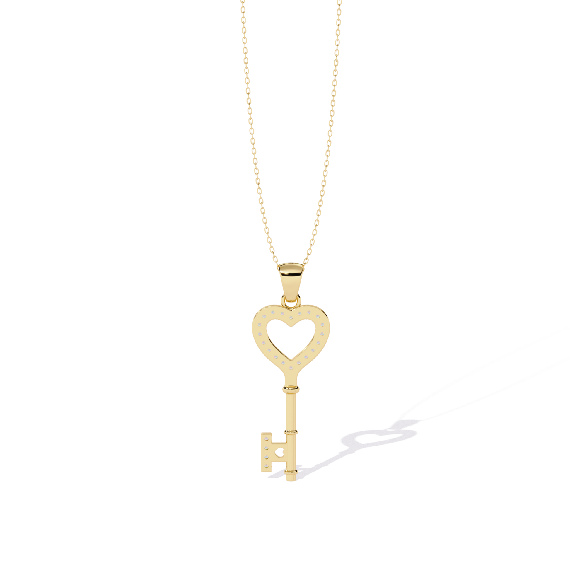 Yellow gold open heart key pendant rear view showing open heart cutout, visible dotted diamond seat holes, smooth plain back surface, and straight key back structure